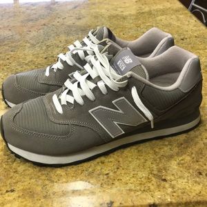 New Balance 574. Never worn these shoes!!